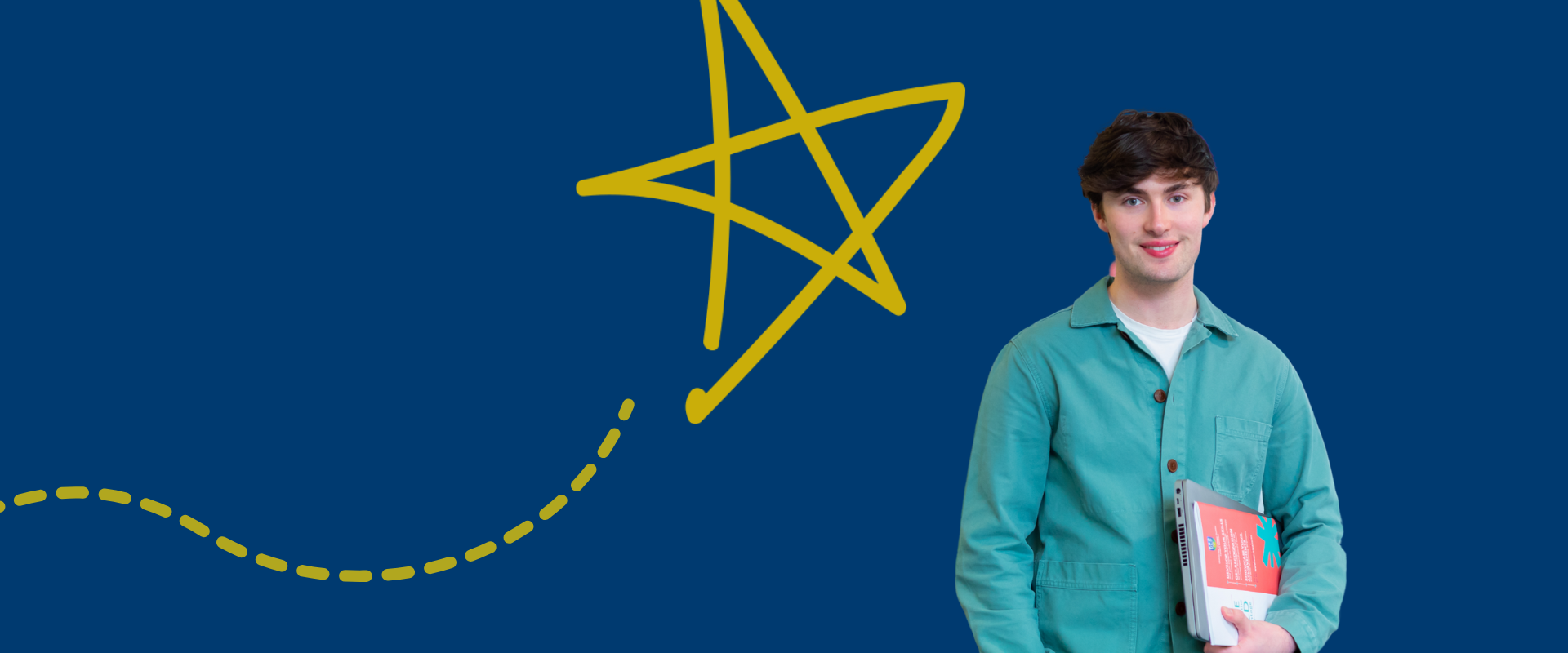 A student smiling against a navy background